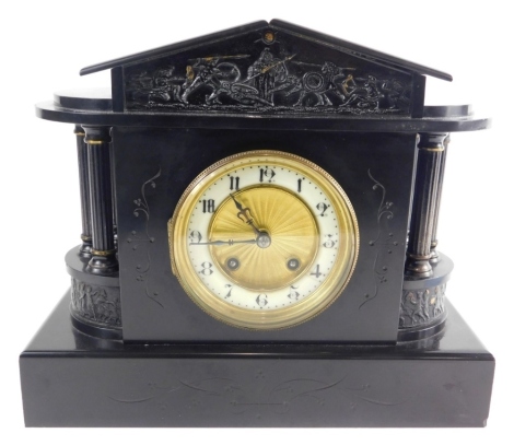 A Victorian architectural design slate mantel clock, the 11cm diameter Arabic dial flanked by turned columns on a plain square plinth base, with eight day movement, 28cm high, with key.