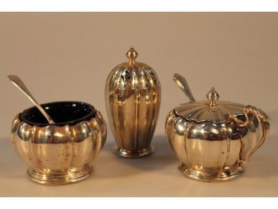 A mid 20thC silver three piece cruet set by George Tarrat