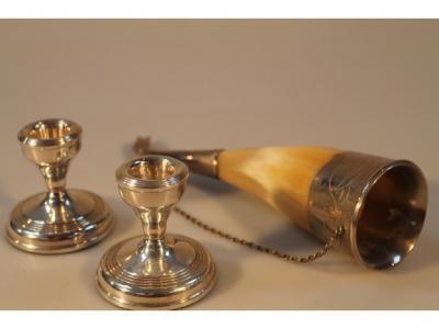 A pair of modern silver boudoir candlesticks