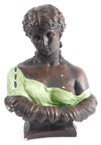 A heavy classical plaster bust of a lady, quarter profile, semi clad, 36cm high.