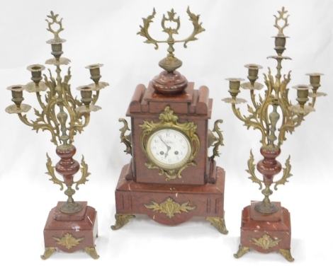 A 19thC marble clock garniture, with gilt metal highlights 11cm diameter Arabic dial with an eight day movement in architectural case, the front raised by gilt metal leaves on scroll feet, with part urns and other embellishments (a quantity AF)