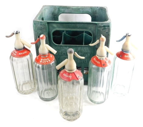 Various soda siphons Adcocks etc, 36cm high (5), in an 'on deposit' crate.