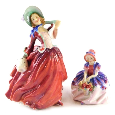 A Royal Doulton figure Autumn Breezes, R835666, printed marks beneath,21cm high, and another Monica. (2)