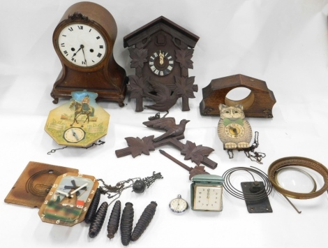 Various clocks, part clocks, clock workings, etc., a Black Forest style cuckoo clock, carved with birds and leaves, 32cm high, an oak cased mantel clock with 15cm diameter circular dial, etc. (a quantity, AF)