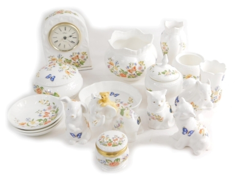 Various Aynsley Cottage Garden wares, mantel clock, 17cm high, various ornaments, lidded jars, puppy, etc, printed marks beneath. (a quantity)