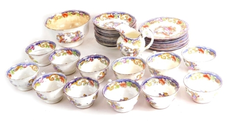 A 19thC transfer printed part tea service, to include slop bowl, 16cm wide, milk jug, cups, saucers, etc., polychrome decorated with outer border of flowers. (a quantity)