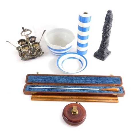 Various bygones and collectables, an Inuit style totem figure, signed T Horn Canada, 29cm high, a small Abbey & Sons tape measure, silver plated egg cruet set and a small quantity of T G Green blue and white pottery. (a quantity)