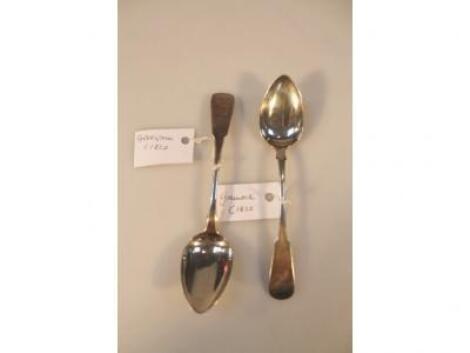 A pair of early 19thC Scottish provincial silver fiddle pattern teaspoons