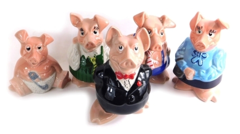 A set of five Natwest Pigs, to include Maxwell, 18cm high, raised marks with stoppers. (5, baby pig lacking stopper)