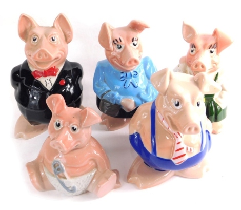 A set of five Natwest Pigs, to include Maxwell, 18cm high, raised marks with stoppers. (5)