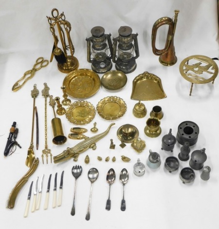 Various metalware, an early 20thC copper and brass bugle marked Royal Welsh Fusiliers, 33cm long, Tilly lamps, pierced trivet decorated with birds, fireside companion set etc., (a quantity).