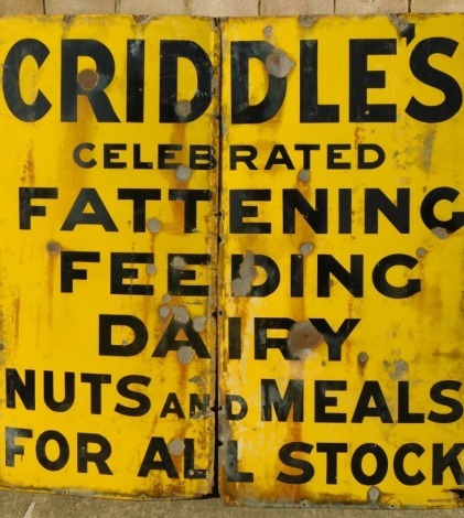 A 20thC two part enamel sign Criddles, Celebrated Fattening Feeding Dairy And Meals For All Stock advertising sign, in black lettering on yellow background in two sections, 153cm each section approx 74cm wide