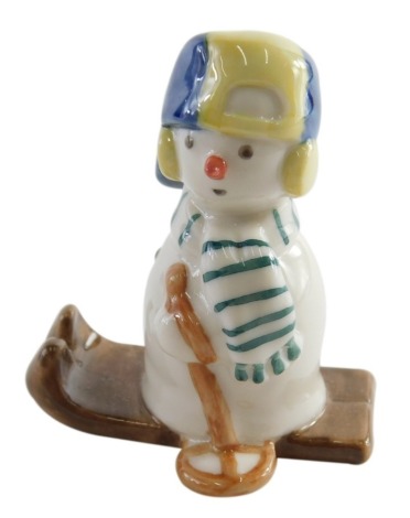 A Royal Copenhagen Collection Snowman figure, no. 771, 6cm high, partially boxed and two other similar vacant boxes. (3)