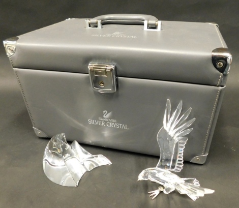 A Swarovski silver crystal eagle, in full cut crystal, limited edition no. 4871/10000, boxed with certificate, the case 38cm wide.