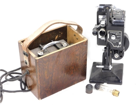 A vintage Kodascope model G series II projector, in fitted case, 43cm high, with accessories.