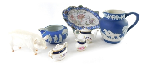 A Beswick pottery pig C H Wall Queen, 8cm high, enamel dish, miniature Coalport service and Wedgwood Dark Blue Jasperware jug and another Adams Tunstall Jasperware jug. (a quantity)