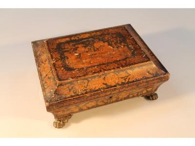 An early 19thC Chinoiserie needlework box decorated with central panel