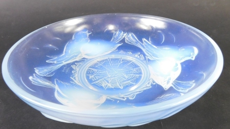 A 20thC Ezan France opalescent and clear glass bowl, decorated with birds, marked to the side 25cm diameter.