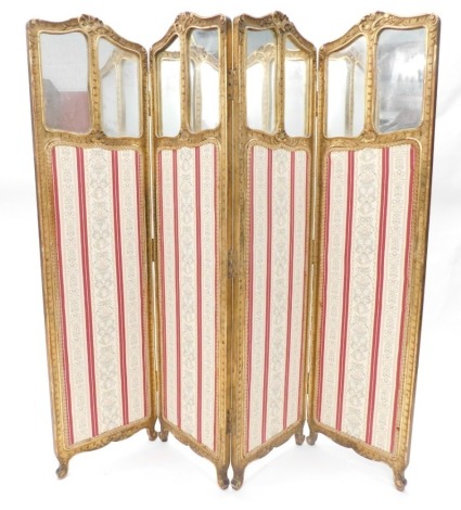 An early 20thC four fold dressing screen, of small proportion, in serpentine frame with upper glass panels and material sections beneath, 144cm high.