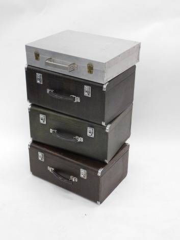 A vintage heavy duty case, possibly a sewing machine case, with Cheney locks, 21cm high, 50cm wide, 32cm deep, and three other similar heavy duty cases.