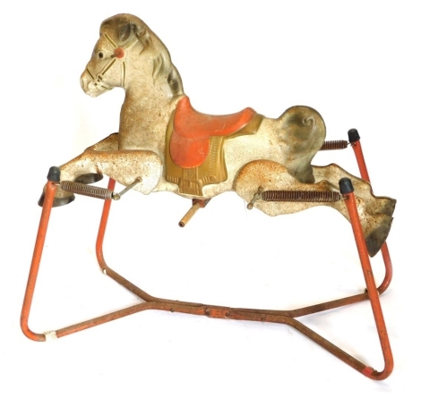 A Mobo Prairie King painted and cast metal rocking horse, on tubular metal frame, 98cm wide.