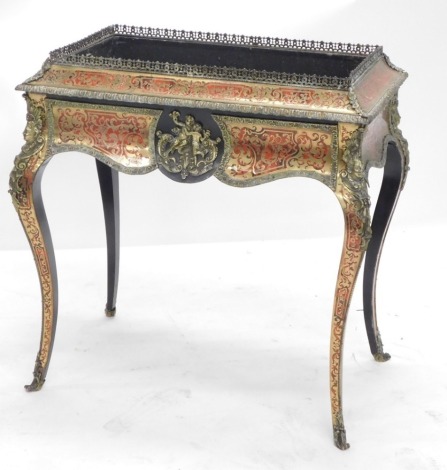 A Victorian ebonised and Boulle jardiniere, the rectangular top with a pierced gilt metal gallery surrounding a metal liner, the shaped frieze applied with Putti and flanked by female caryatid on cabriole legs with sabot feet, 81cm high x 83cm wide x 51cm