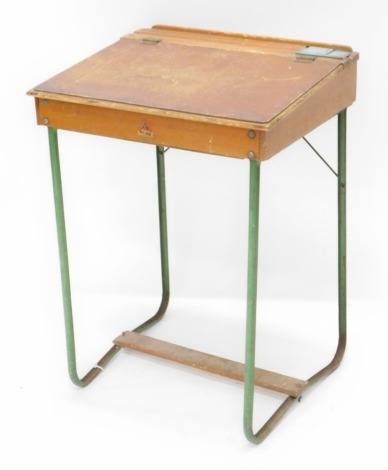 A Triang child's desk, with hinged slope top and green painted tubular frame. 53cm wide