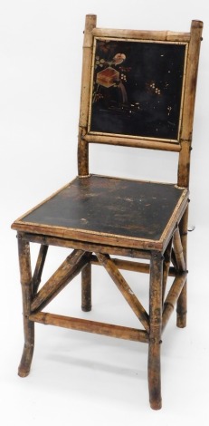 A Victorian bamboo and oriental lacquer chair, decorated with birds, etc.