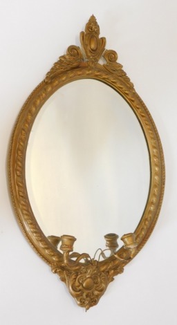 A gilt gesso girandole, with a shaped leaf moulded and shaped crest above two candle arms, etc., 85cm high, 50cm wide. (AF)