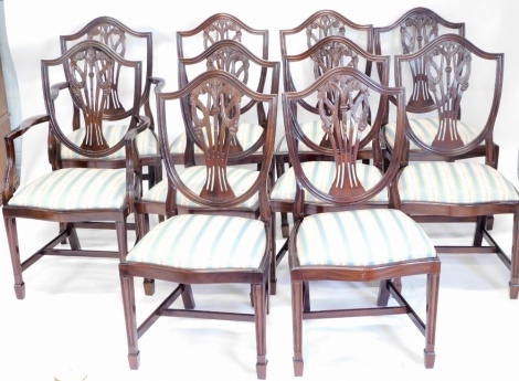 A set of ten (8+2) mahogany Hepplewhite style dining chairs, each with drop in seats, serpentine fronts and wheatsheaf shield backs. (10)