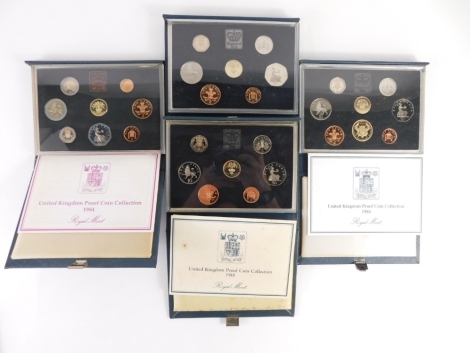 Various Royal Mint coin sets, 1984, 1985 (2), and 1986. (4)