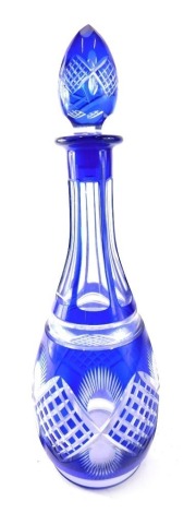 A Bohemian style blue flash decanter and stopper, 37cm high.