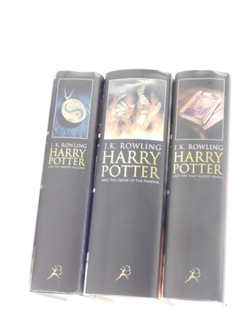 Rowling (J K), Harry Potter and The Order of The Phoenix, Half Blood Prince and Deathly Hallows, each Bloomsbury hardback first editions 2005, etc., with dust wrappers. (3)