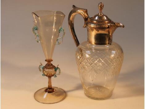 A Venetian style Facon de Venise glass and a cut glass jug with plated mounts and handles