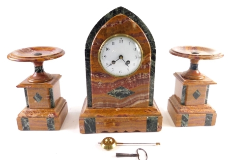 A late 19thC clock garniture, comprising marble mitre shaped clock, 33cm high, with 12cm diameter Arabic raised enamel dial, revealing an eight day movement with two veined marble garniture, 24cm high. (3)