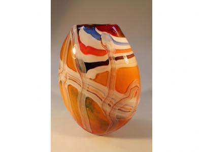 A Murano style ovoid orange glass vase