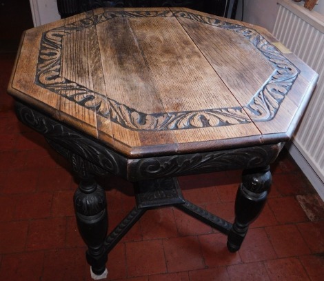 A late Victorian carved oak window table, of octagonal form, with foliate frieze, baluster legs and under shelf, 96cm diameter, bearing a brass engraved plaque inscribed 1858 Jubilee Year - 1908 Presented To The Belmonston Bowling Club By Henry D Sharp.