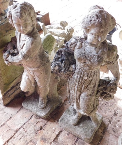 A pair of reconstituted figures of children with baskets (one AF), 75cm high.