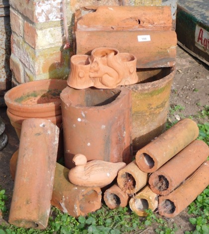 A group of terracotta garden wares.