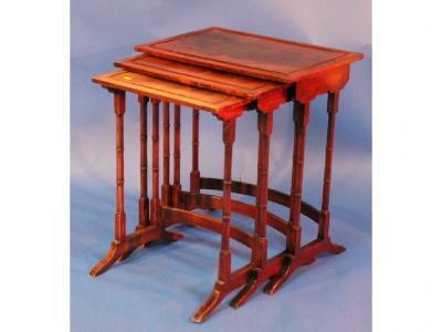 A nest of three Regency style tables