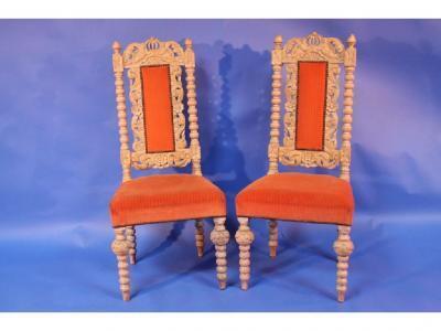 A pair of Victorian limed oak hall chairs