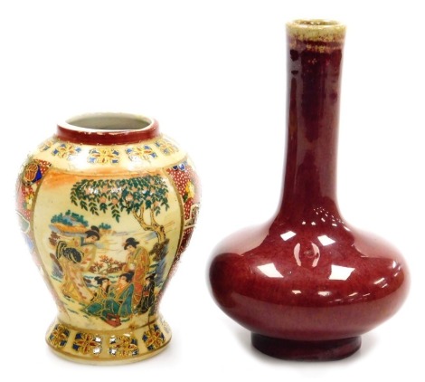 A Chinese sang de boeuf porcelain vase, of long necked, bulbous form, 15cm high, and a modern Japanese vase with printed decoration, 11cm high. (2)