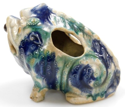 A Chinese pottery vase, modelled in the form of a seated toad, with blue and green mottled glaze, 19cm long. - 2