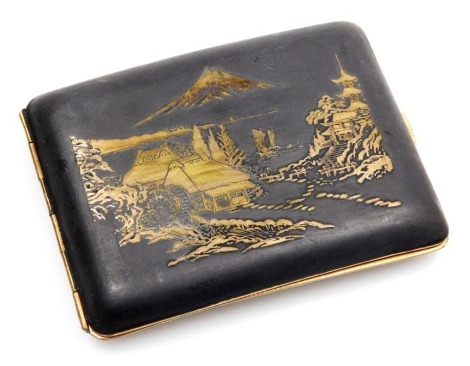 An early 20thC Japanese inlaid iron cigarette case, decorated with a village and lake scene, Mount Fuji beyond, verso two homesteads and trees, 11cm wide.