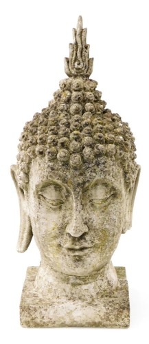 A 20thC concrete Buddha's head, raised on a square base, 57cm high. (AF)