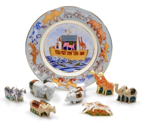 A group of Royal Crown Derby miniature porcelain Noah's Ark animals, comprising elephants, giraffes, cheetahs, camels, zebras, hippos, and water buffalo, 6cm high, five boxed, and a Noah's Arc plate, commissioned by Sinclair's, limited edition number 153/