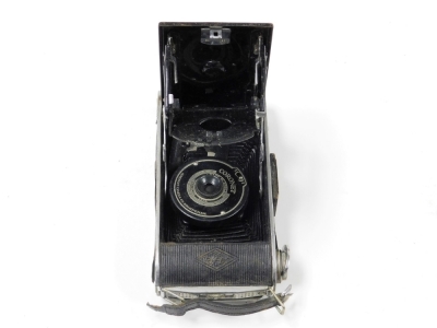 An Olympus pen-f camera, with 1..18 f=38mm lens, number 129037, an Agfa Coronet camera, Kodak Brownie Flash IV camera, cased, and a pair of opera glasses, cased. (4) - 2