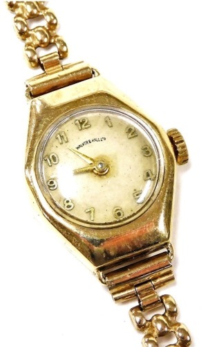 A mid century Walker & Hall lady's 9ct gold cased wristwatch, circular champagne dial bearing Arabic numerals, on a gold bracelet strap with snap clasp, 11.8g all in.