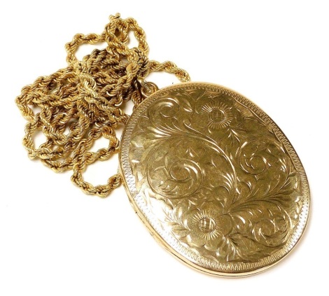 A 9ct gold oval photo locket, floral and foliate engraved, on a rope twist neck chain, with a bolt ring clasp, 35.7g.