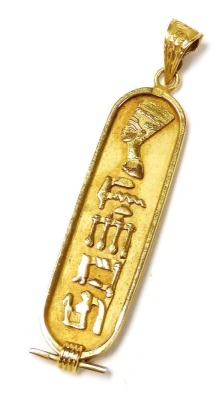 An Egyptian hieroglyphs pendant, of oval form, yellow metal, 5.3g.